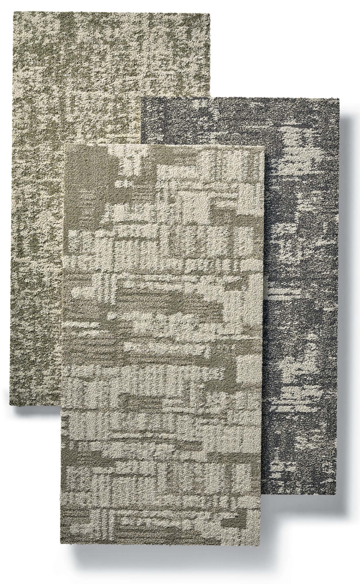 A set of three rugs with different textures.