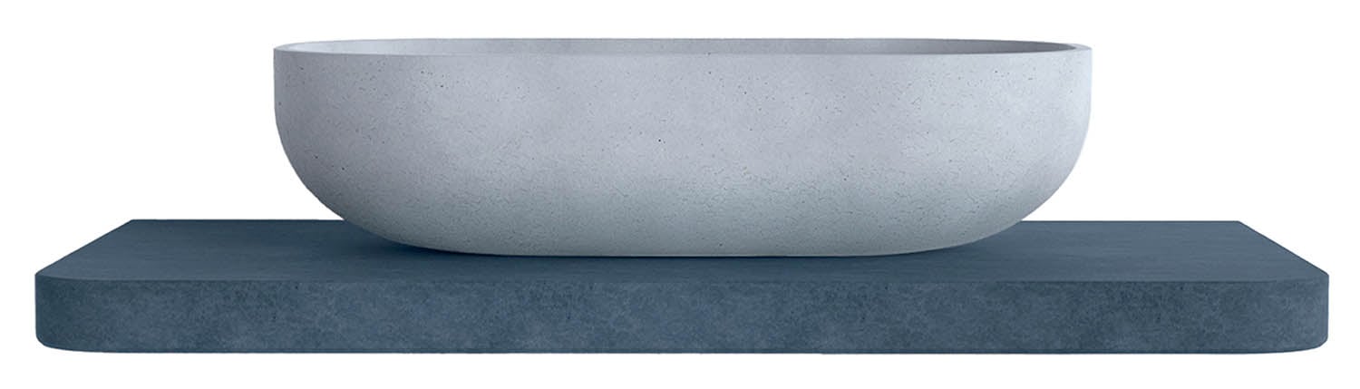 A concrete bowl on a block.