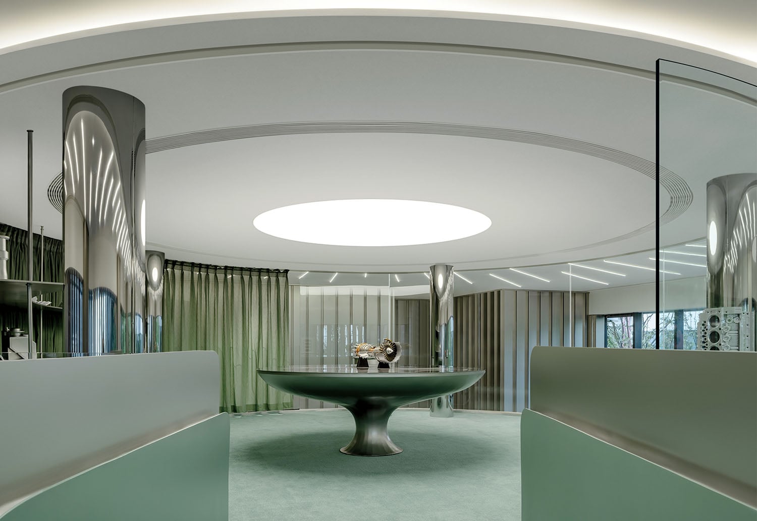 A room with a round table and a mirror.