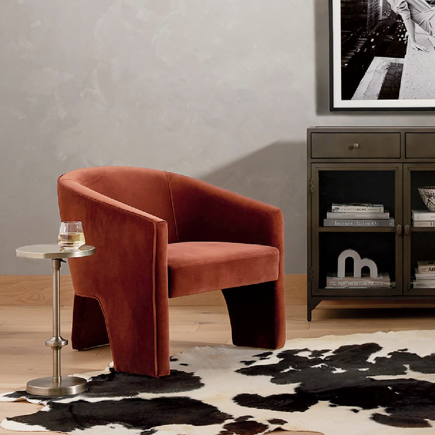 A living room with a chair and a television