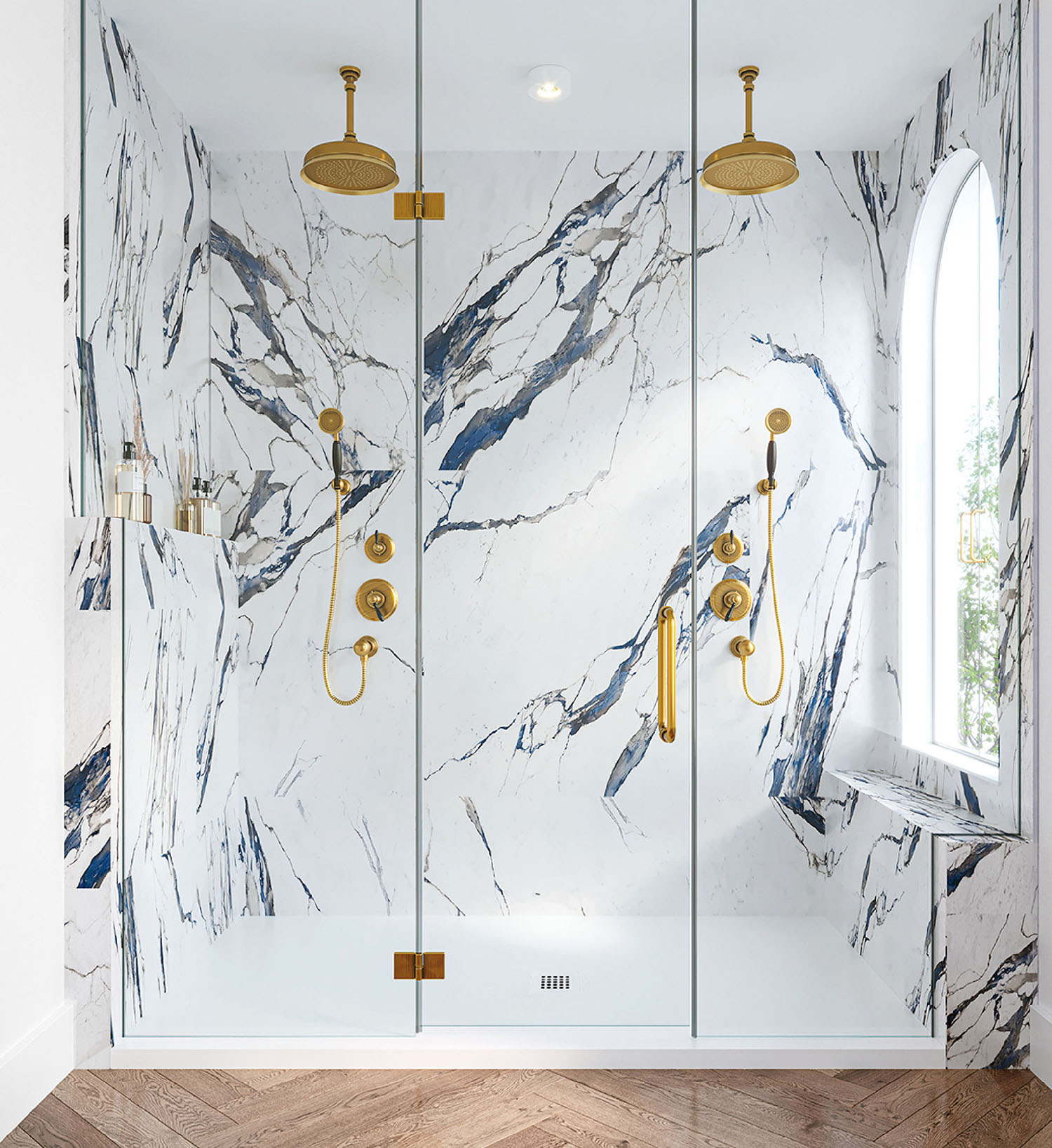 A bathroom with a marble shower and a gold fa fa fae fae fae fae.