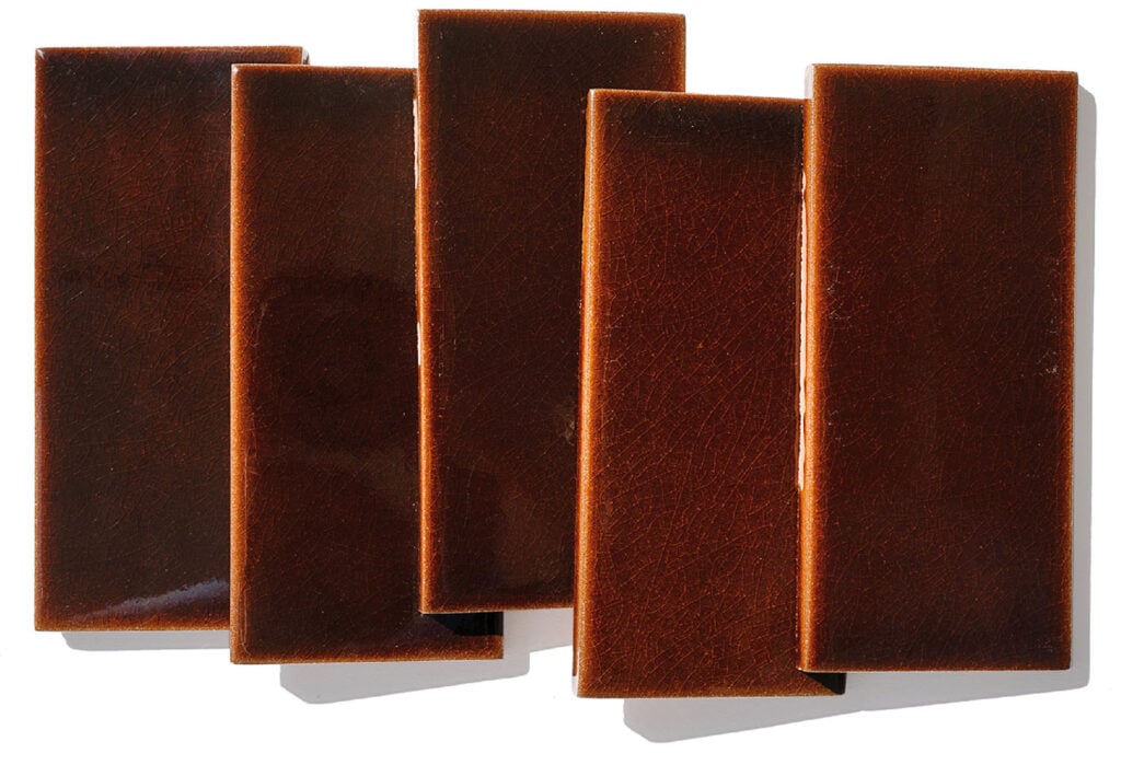 Three pieces of brown soap.