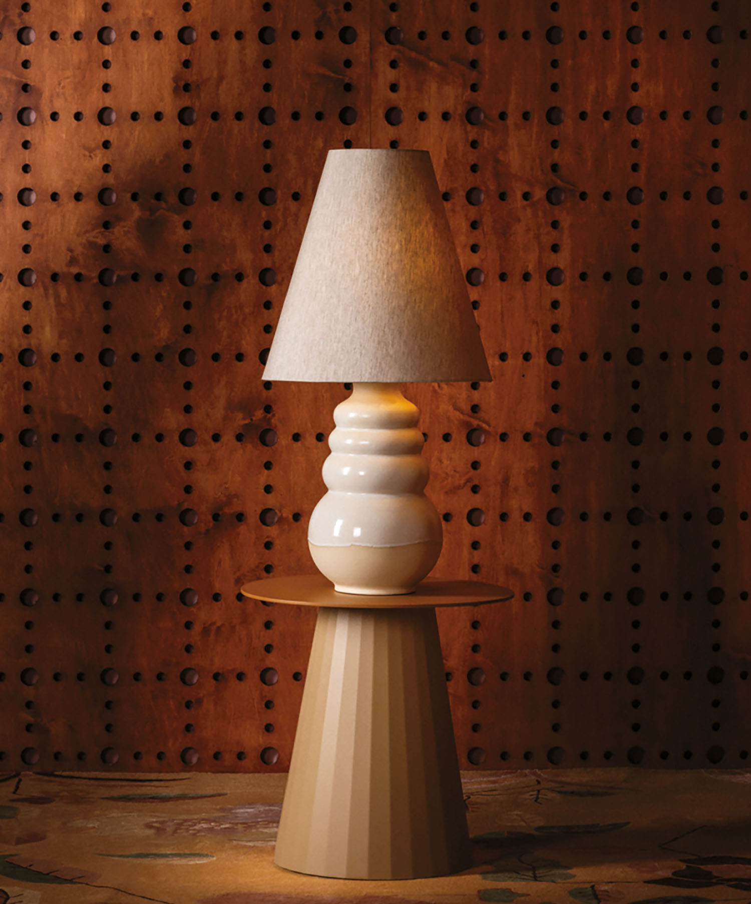 A lamp on a table.