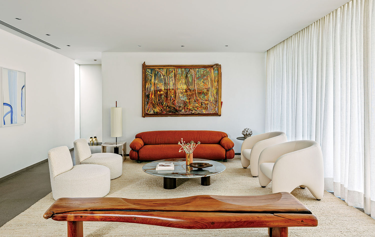 A living room with a couch and a coffee table.