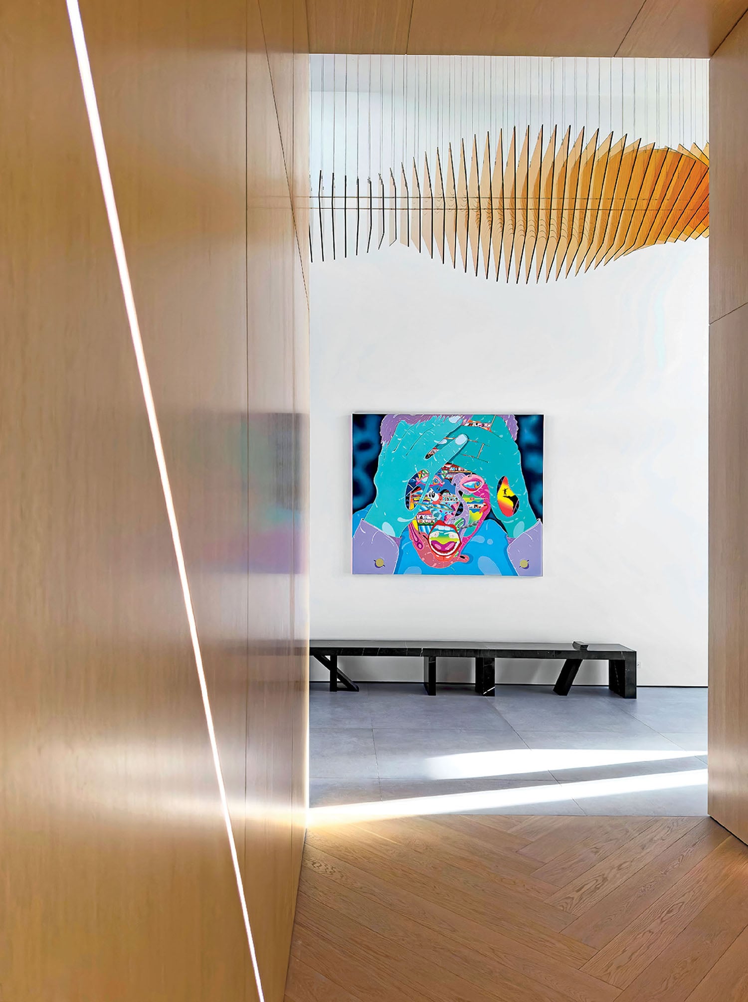 A painting on a wall in a room.