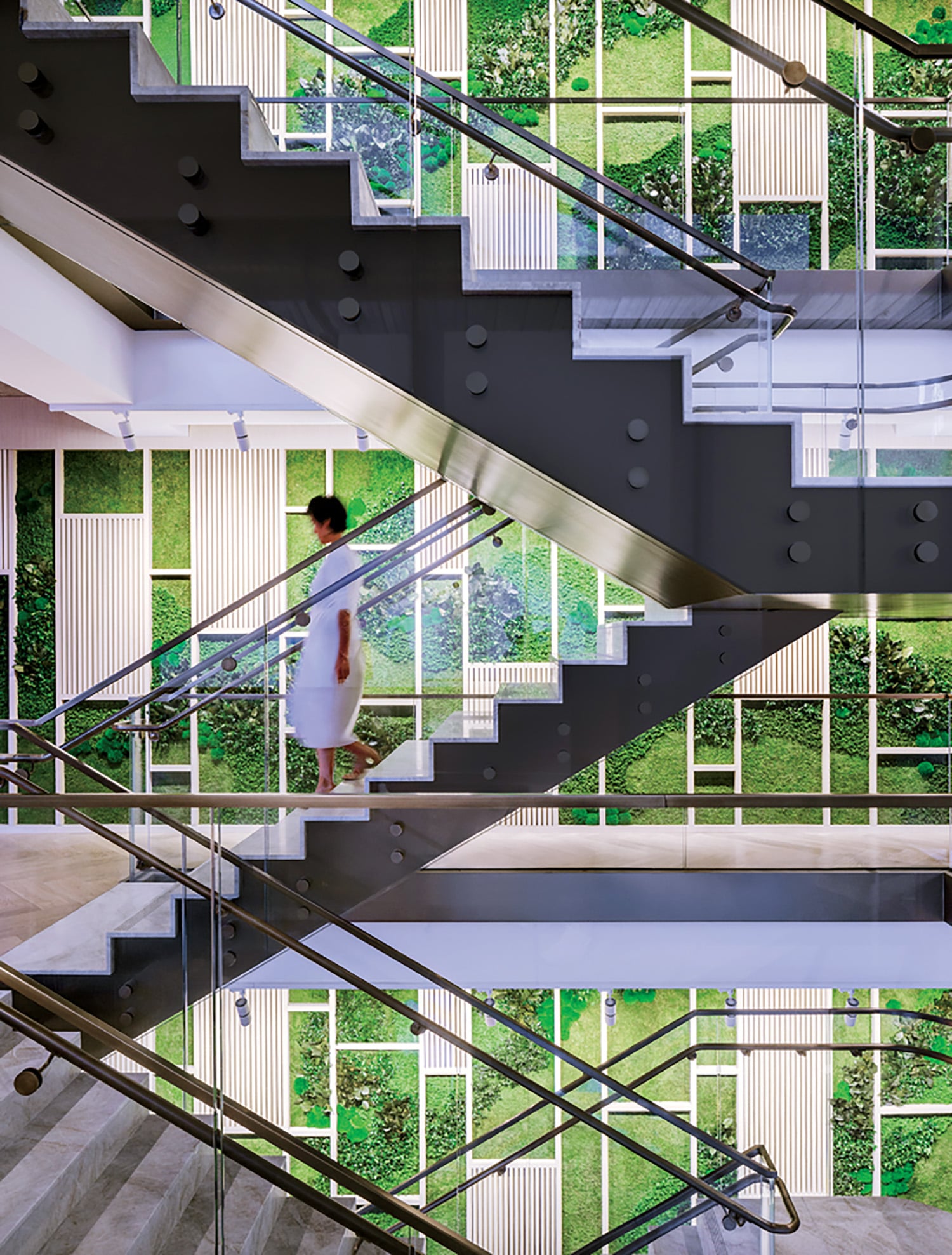 A man walking up a set of stairs.