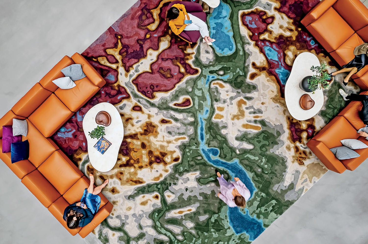 A group of people sitting around a table.