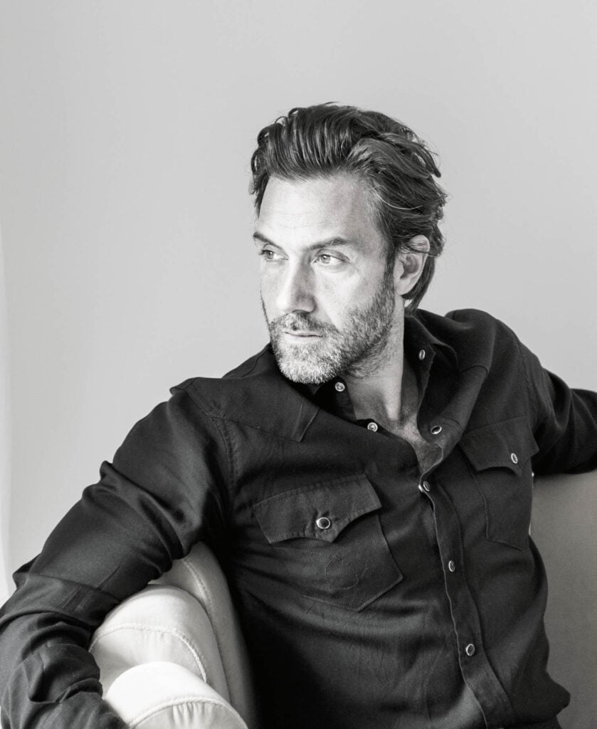 man in black button down shirt