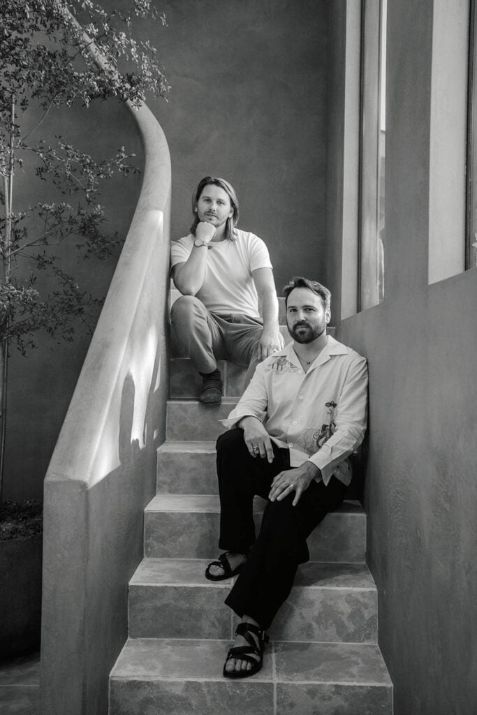 two people on a stair