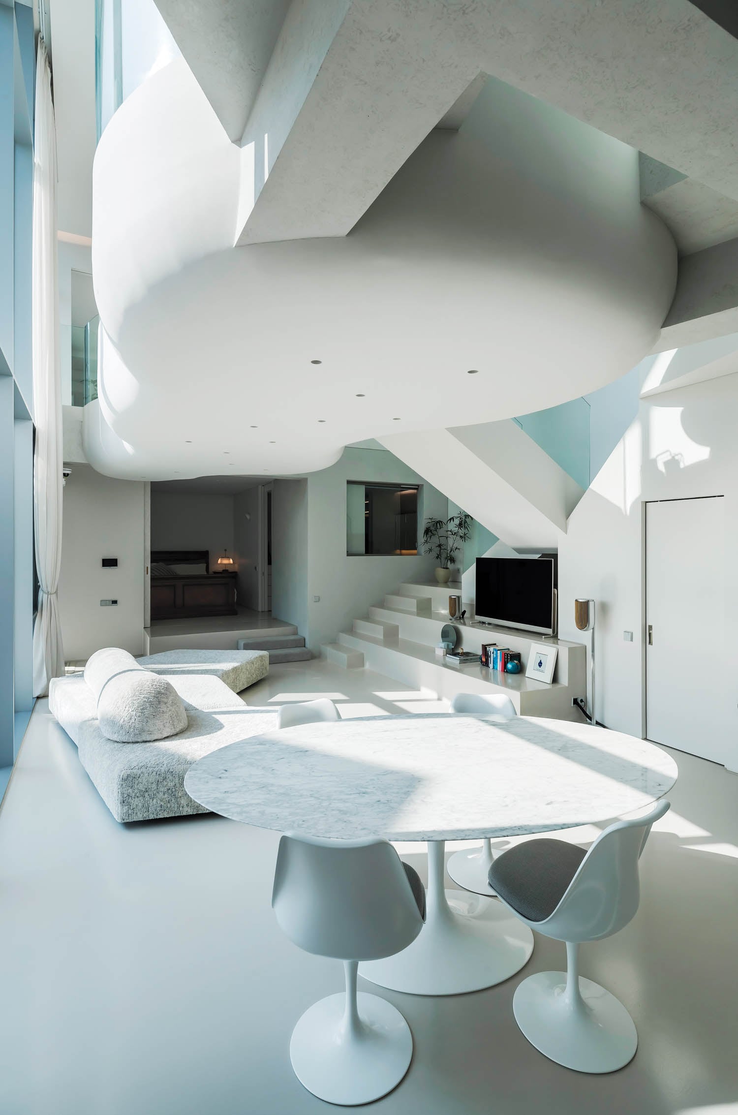 dining area with all white furnishings