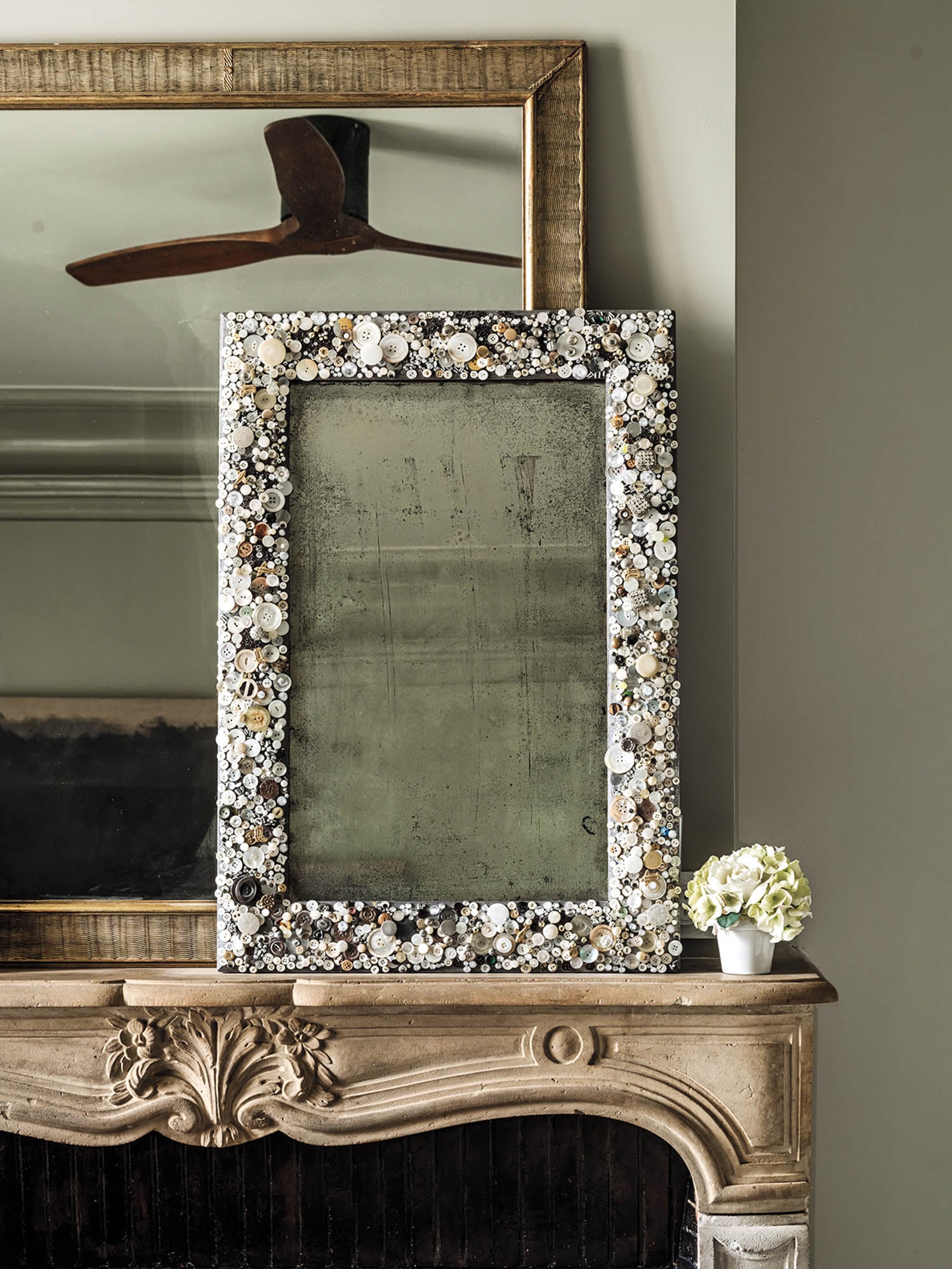 shell-encrusted mirror in main bedroom