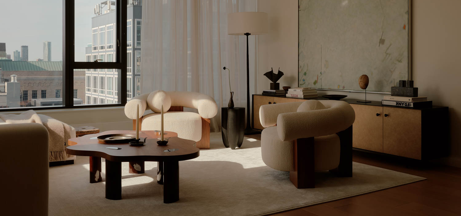 living room with custom steel and leather console and white chairs