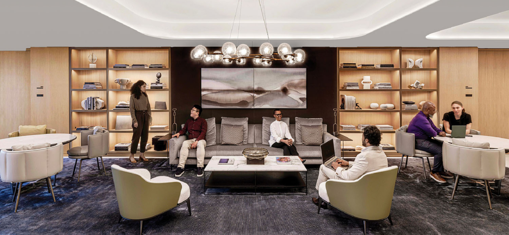 sitting area with brightly lit shelves and chairs