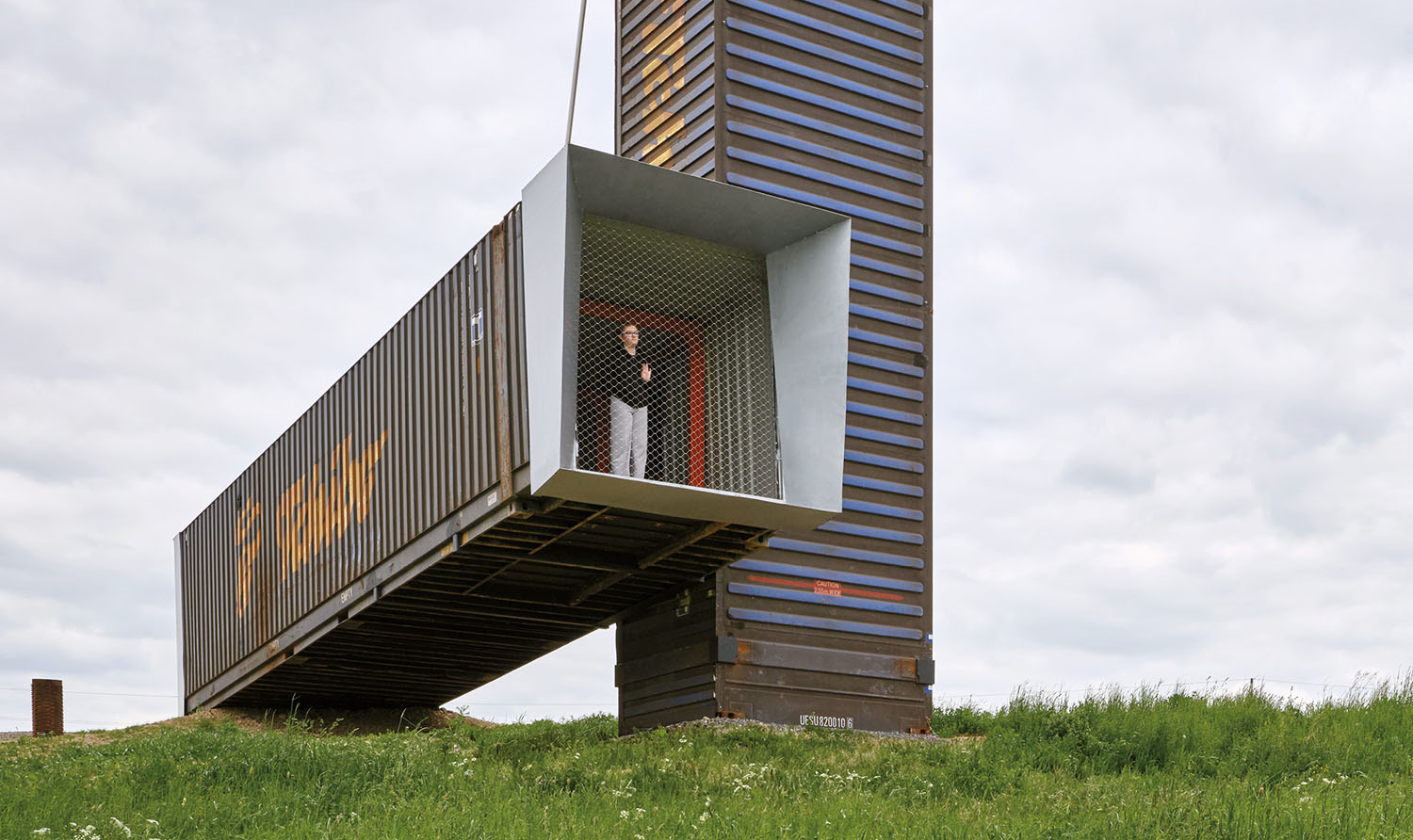 shipping container connected to building